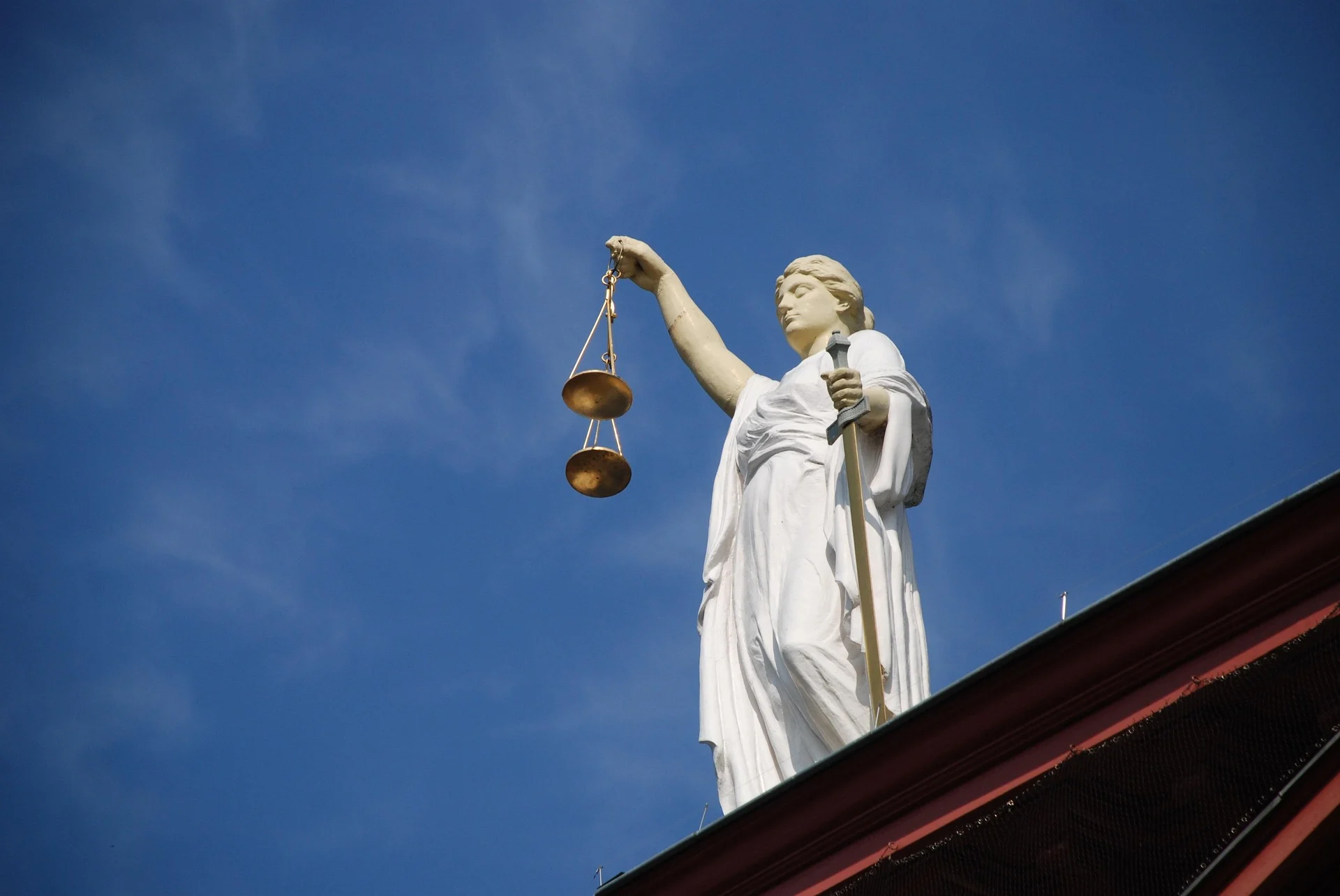 Statue of Lady Justice holding scales